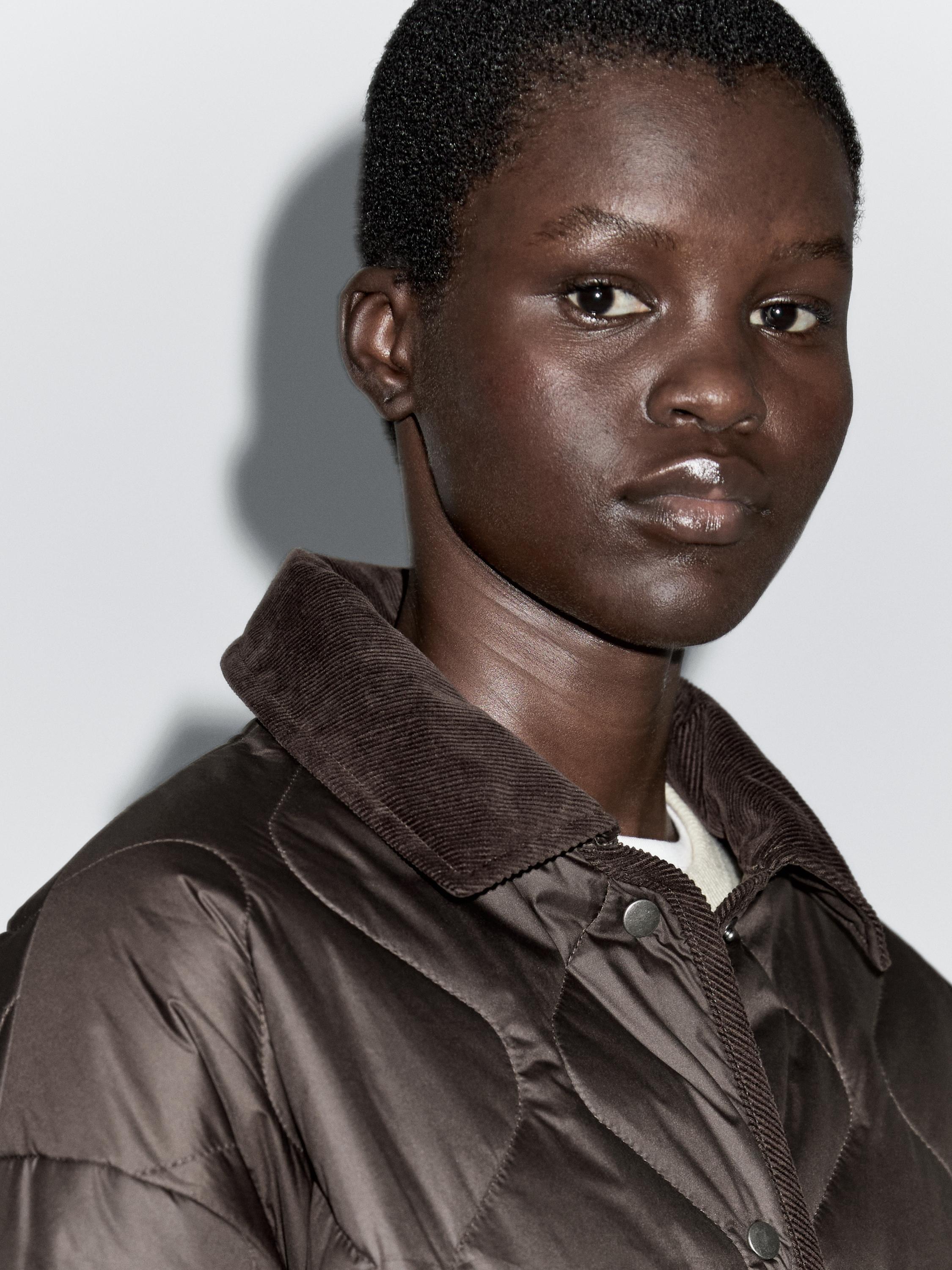 Water-repellent puffer jacket with corduroy detail